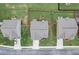 Aerial view of a home with a fenced-in backyard, surrounded by green grass and neighboring houses at 1173 Gaines St, Jonesboro, GA 30238