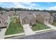 Aerial view of a beautiful two-story brick home with a two-car garage and manicured lawn at 1173 Gaines St, Jonesboro, GA 30238