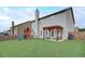 Spacious backyard with pergola patio, playset, and well-maintained lawn at 1173 Gaines St, Jonesboro, GA 30238