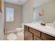 Half bathroom featuring a wood cabinet and a marble countertop at 1173 Gaines St, Jonesboro, GA 30238