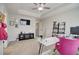Bedroom features a desk area, media console, and TV at 1173 Gaines St, Jonesboro, GA 30238
