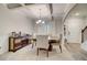 Formal dining room with coffered ceilings, chandelier, and view into the stairway at 1173 Gaines St, Jonesboro, GA 30238