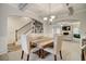 Dining room with coffered ceilings open to the staircase and living room, creating an inviting atmosphere at 1173 Gaines St, Jonesboro, GA 30238