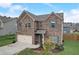 Beautiful brick two-story home with well-manicured landscaping and a two-car garage at 1173 Gaines St, Jonesboro, GA 30238