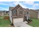Charming two-story brick home with a two-car garage, manicured lawn, and traditional design at 1173 Gaines St, Jonesboro, GA 30238