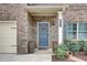 Close up of the front door and entry way at 1173 Gaines St, Jonesboro, GA 30238