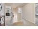 Hallway with carpet, connecting bedrooms and providing access to different areas at 1173 Gaines St, Jonesboro, GA 30238