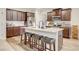 Kitchen with large island, stainless appliances, and breakfast bar at 1173 Gaines St, Jonesboro, GA 30238