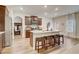 Kitchen with large island, stainless appliances, and breakfast bar with view into breakfast nook at 1173 Gaines St, Jonesboro, GA 30238