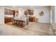 Kitchen with large island and breakfast bar; open to breakfast nook at 1173 Gaines St, Jonesboro, GA 30238