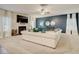 Spacious living room boasts plush carpet, an inviting fireplace, and stylish decor at 1173 Gaines St, Jonesboro, GA 30238