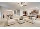 Open floor plan with great room and view into the kitchen, neutral carpet, and lots of natural light at 1173 Gaines St, Jonesboro, GA 30238