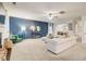 Bright living room with neutral carpet, accent wall, and lots of natural light at 1173 Gaines St, Jonesboro, GA 30238