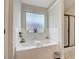 Bathroom featuring a soaking tub, a separate shower, and white tiled walls at 1173 Gaines St, Jonesboro, GA 30238