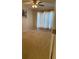Bedroom with neutral walls, carpet, a ceiling fan, and natural light from the window at 2863 Hillvale Cove Dr, Lithonia, GA 30058