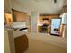 Bright kitchen with wooden cabinets, stainless steel appliances, and ample counter space at 2863 Hillvale Cove Dr, Lithonia, GA 30058