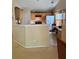 Kitchen area with light wood cabinets, stainless steel appliances, and an eat-in area at 2863 Hillvale Cove Dr, Lithonia, GA 30058