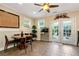 Bright dining area with a round table and chairs next to the door to the back yard at 3332 Heathchase Ln, Suwanee, GA 30024
