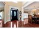 Welcoming foyer with decorative statues, an elegant front door, and access to the dining room at 3332 Heathchase Ln, Suwanee, GA 30024