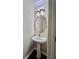 A well-lit bathroom with pedestal sink and decorative light fixture at 415 Wood Trace Ct, Alpharetta, GA 30022