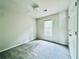 Cozy bedroom featuring soft carpeting and a bright window for natural light at 415 Wood Trace Ct, Alpharetta, GA 30022