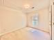 Neutral bedroom features a carpet floor and a window that brings in natural light at 415 Wood Trace Ct, Alpharetta, GA 30022