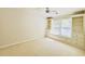 Bedroom with built-in shelving, window seat, and natural light at 415 Wood Trace Ct, Alpharetta, GA 30022