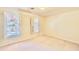 Bedroom with neutral walls and carpet, offering a serene space at 415 Wood Trace Ct, Alpharetta, GA 30022