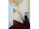 Bright foyer with hardwood floors, staircase, and an open view of the second level at 415 Wood Trace Ct, Alpharetta, GA 30022