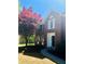 Close up of a red brick home, showcasing the front entrance at 415 Wood Trace Ct, Alpharetta, GA 30022