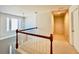 Upstairs hallway featuring a pendant light fixture at 415 Wood Trace Ct, Alpharetta, GA 30022