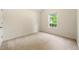 Cozy bedroom with neutral carpet and bright window at 85 Old Gettysburg Way, Dallas, GA 30157