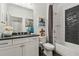 Cozy bathroom with a shower-tub combo, modern fixtures, and a granite countertop at 1241 Hightower Nw Xing, Marietta, GA 30060