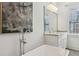 Bright bathroom with a freestanding tub, double vanity with granite, and a window at 1241 Hightower Nw Xing, Marietta, GA 30060
