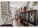 A walk-in closet with custom shelving, a built-in dresser, and hardwood flooring at 1241 Hightower Nw Xing, Marietta, GA 30060