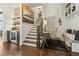 Inviting entryway with a staircase, bench seating and access to the living spaces at 1241 Hightower Nw Xing, Marietta, GA 30060