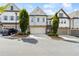 Charming townhome with a two-car garage and well-maintained landscaping, perfect for suburban living at 1241 Hightower Nw Xing, Marietta, GA 30060