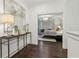 Hallway view leading to a luxurious bedroom featuring elegant decor and modern lighting at 1241 Hightower Nw Xing, Marietta, GA 30060