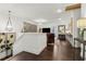 Spacious hallway leading to the living areas with stylish decor and dark hardwood floors at 1241 Hightower Nw Xing, Marietta, GA 30060