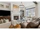 Elegant living area with a fireplace, hardwood floors, and comfortable seating arrangements at 1241 Hightower Nw Xing, Marietta, GA 30060