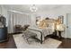 Sophisticated main bedroom with a chandelier, sitting area, and soft, neutral tones at 1241 Hightower Nw Xing, Marietta, GA 30060