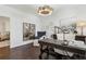 Elegant home office with hardwood floors, designer lighting, and stylish decor with an open doorway at 1241 Hightower Nw Xing, Marietta, GA 30060