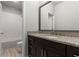 Bathroom with a vanity featuring a granite countertop and tub with white subway tiles at 3415 Kenyon Creek Nw Dr, Kennesaw, GA 30152