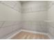 Spacious walk-in closet features extensive wire shelving for optimal storage and organization at 3415 Kenyon Creek Nw Dr, Kennesaw, GA 30152