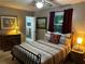 Comfortable bedroom with a ceiling fan, and an ensuite bathroom, providing a private retreat at 3474 Leaf Land Ct, Duluth, GA 30097
