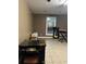 Spacious bonus room with tile flooring, a bright window, and potential for entertainment and relaxation at 3474 Leaf Land Ct, Duluth, GA 30097