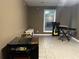 Spacious bonus room with tile flooring, a bright window, and potential for entertainment and relaxation at 3474 Leaf Land Ct, Duluth, GA 30097
