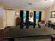 Spacious living room with hardwood floors, stylish furnishings, and a large kitchen island at 3474 Leaf Land Ct, Duluth, GA 30097