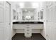 The bathroom features a double sink vanity with dark countertops and modern fixtures at 3820 Roswell Ne Rd # 510, Atlanta, GA 30342