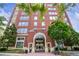 Attractive brick building exterior with well-maintained landscaping and inviting entryway at 3820 Roswell Ne Rd # 510, Atlanta, GA 30342